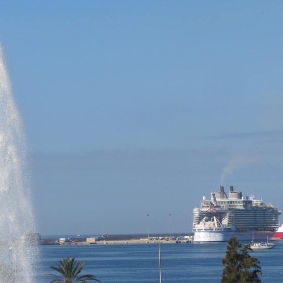 A water fountain near ships