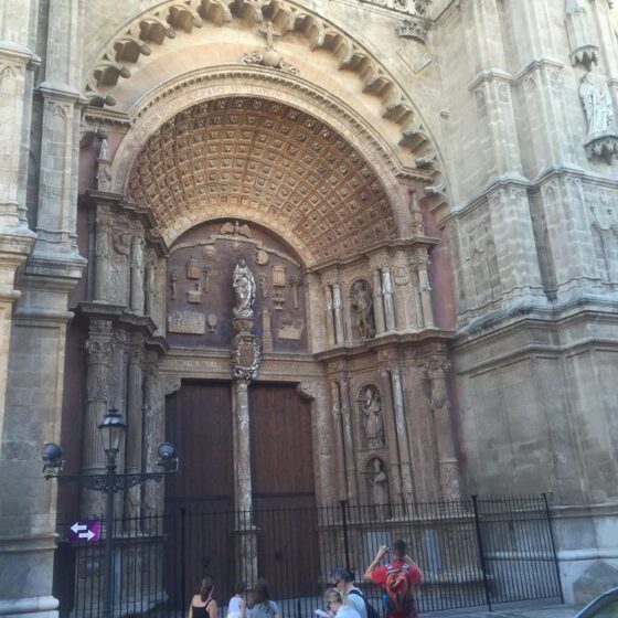 People taking photos of a cathedral